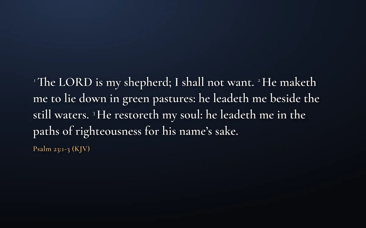 The projector showing Psalm 23:1-3 in the King James Version in a large serif face on a deep blue background, with the reference in amber.