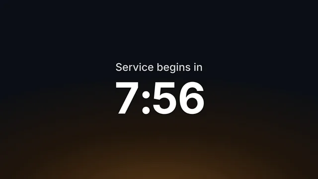 The pre-service countdown, Service begins in 7:56, on the foyer TV.